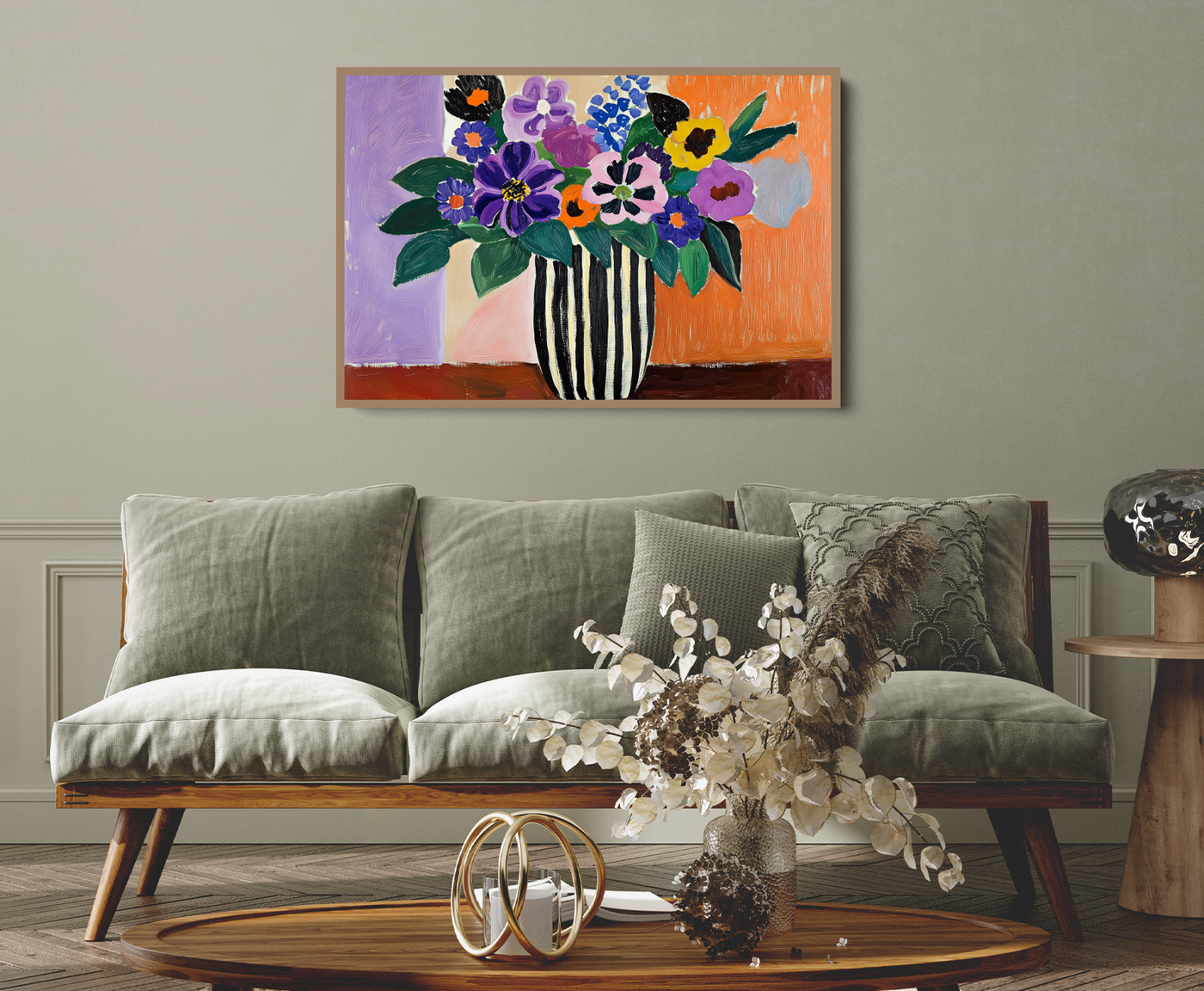Bold, colourful large artwork above a couch. 