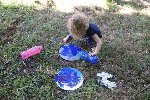 Kids painting in lockdown turns canvas bright blue