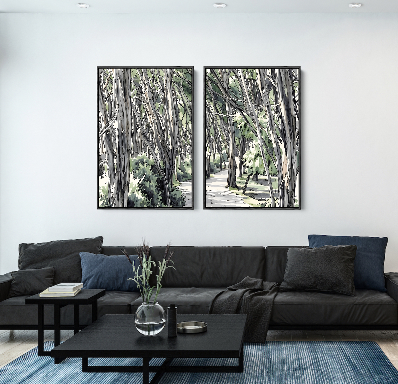 Two framed black and white australian eucalyptus native botanical forest landscape artworks above a dark sofa