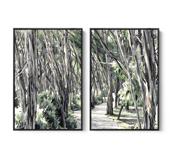 Two framed watercolor forest art prints in black frames featuring gray and green eucalyptus trees for wall decor