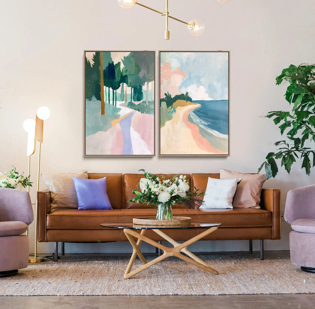 Brown leather sofa with multiple cushions in shades of purple white and beige in a long weekend two piece pastel print set