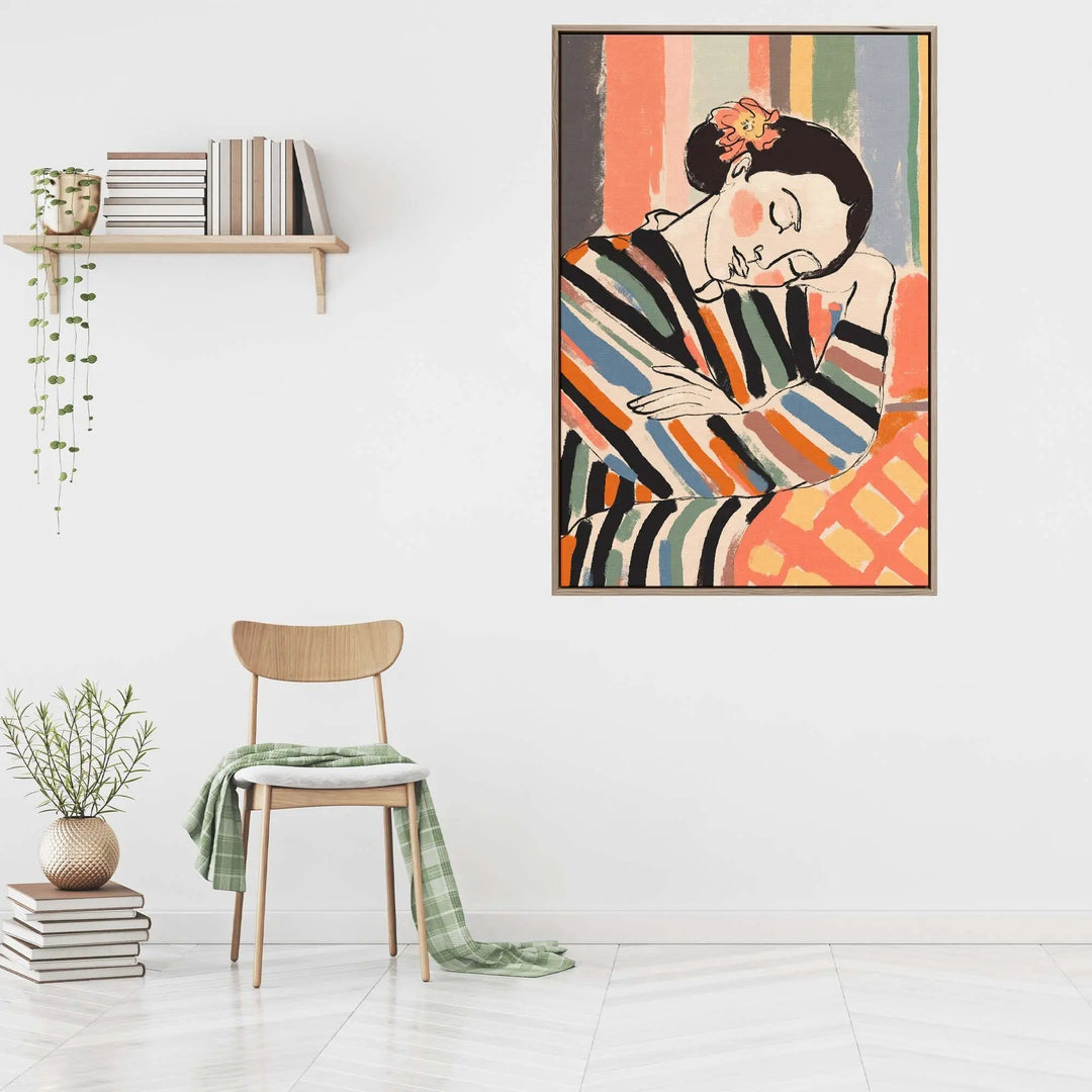 A framed fine art print of a stylized sleeping figure with bold colorful stripes and an orange flower accent by treechild