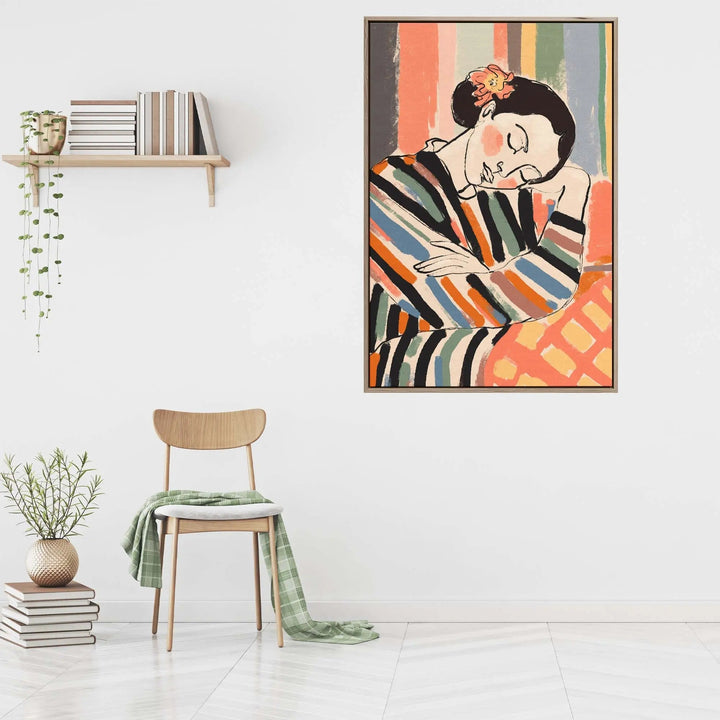 A framed fine art print of a stylized sleeping figure with bold colorful stripes and an orange flower accent by treechild