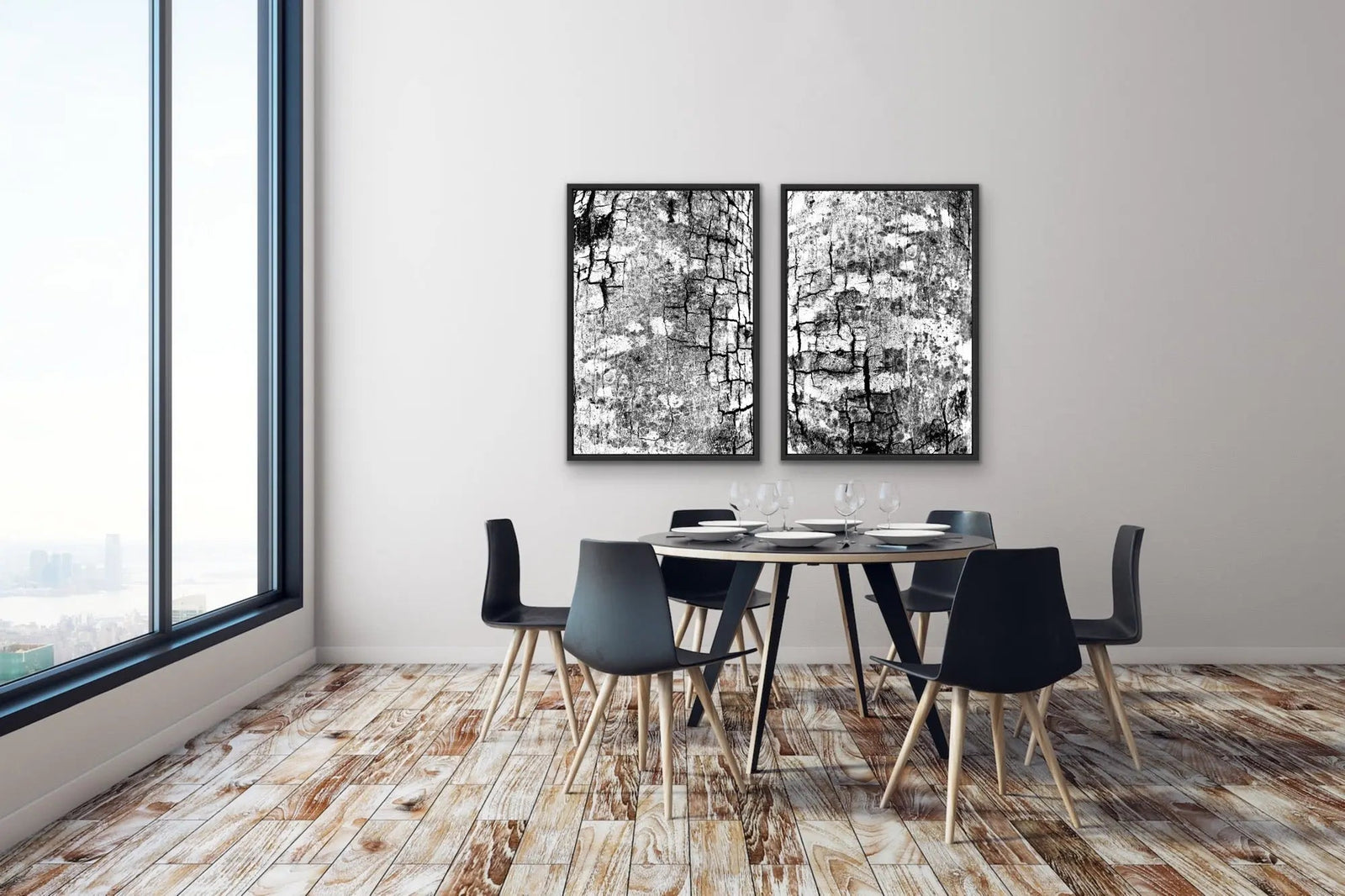 A study of bark in black and white abstract art prints in sleek black frames above a modern dining table
