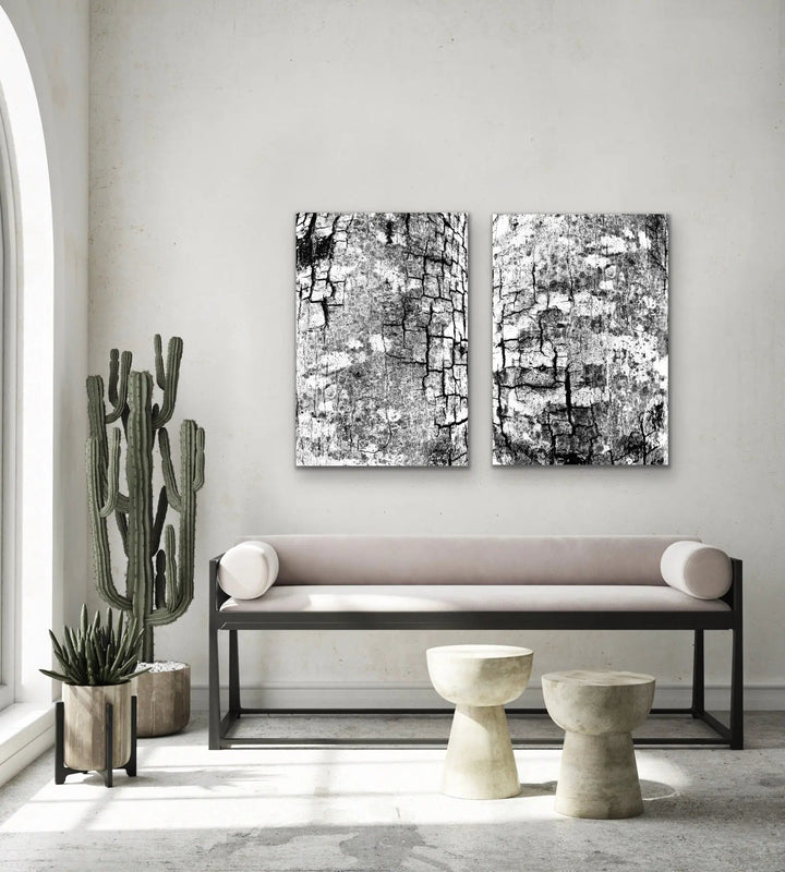 Minimalist black-and-white abstract stretched canvas print with cracked texture displayed in a modern living space