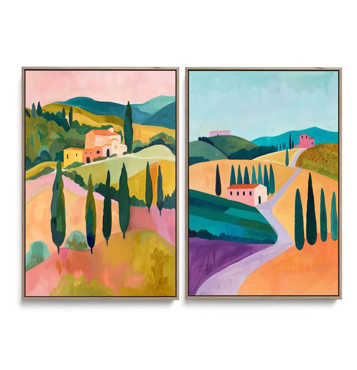 Pair of framed abstract tuscan landscape canvas prints with vibrant pastel hills cypress trees and rustic houses