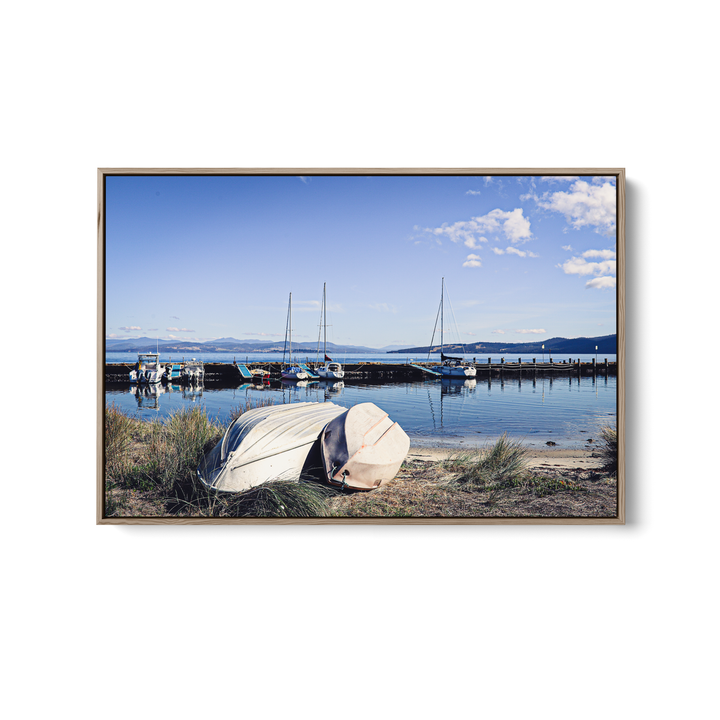 Framed photographic print of alonnah bruny island tasmania featuring a serene harbor with boats and mountains