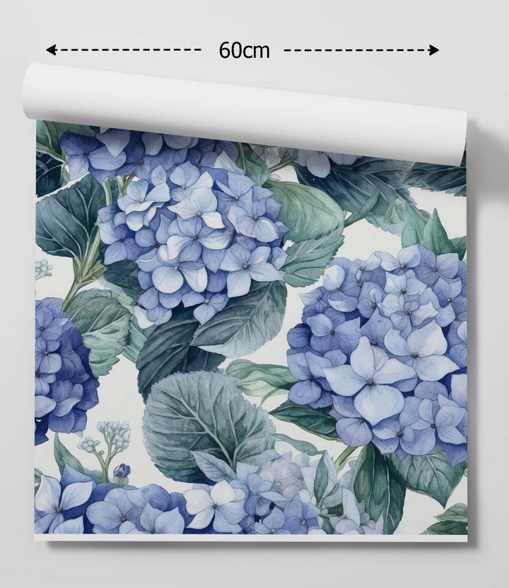 A roll of blue hydrangea classic floral peel and stick removable wallpaper with detailed botanical print on off-white background