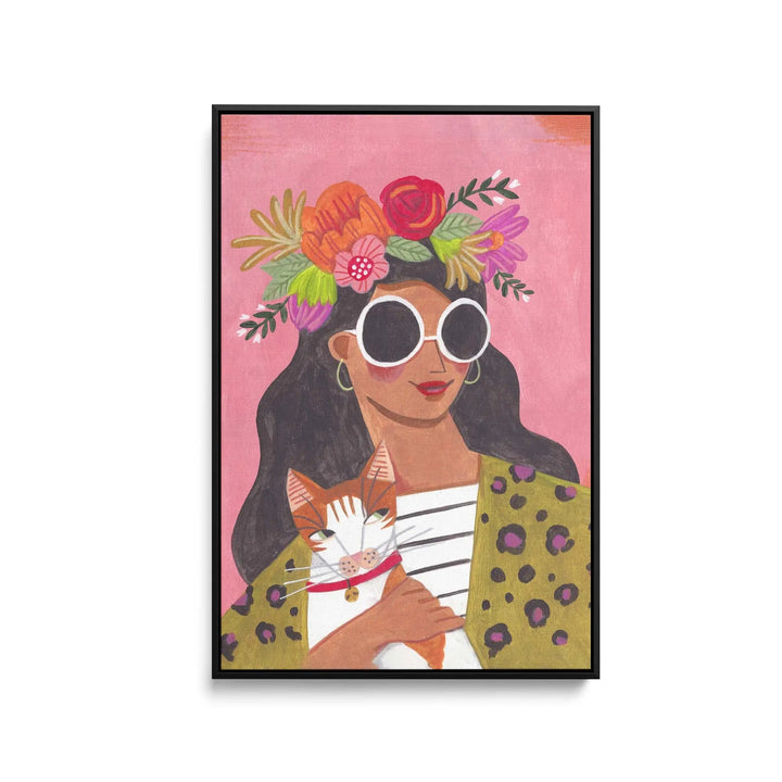 Cat lady by Caroline Bonne Muller framed fine art print of a woman with sunglasses and floral crown holding an orange cat