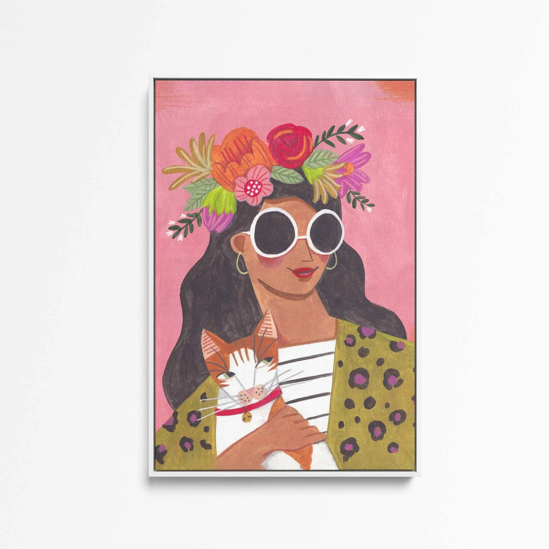 Cat lady by Caroline Bonne Muller vibrant pink-framed stretched canvas print of woman with floral crown holding orange cat