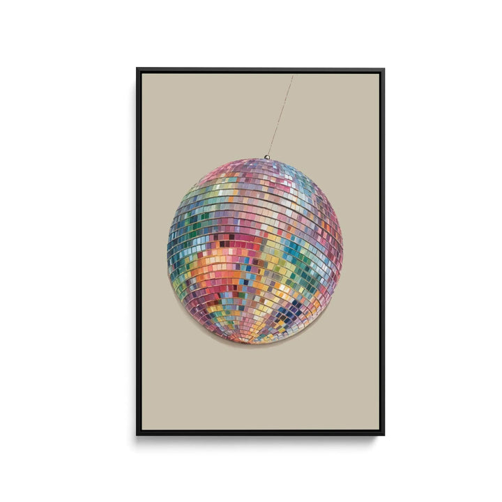 A vibrant multi-colored disco ball with reflective mosaic tiles on a stretched canvas print or framed fine art print