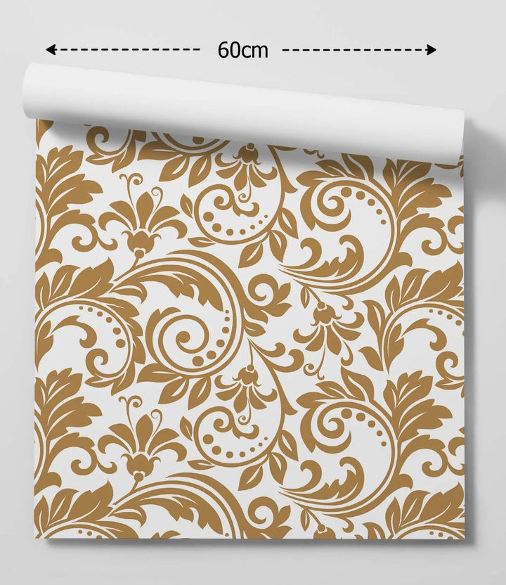 A roll of Doris vintage-inspired white and gold wallpaper with elegant gold damask floral and scrollwork patterns