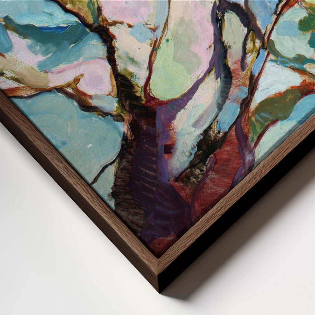 Abstract tree painting in a dark wood frame with bold teal pink purple and red brushstrokes on stretched canvas wall art