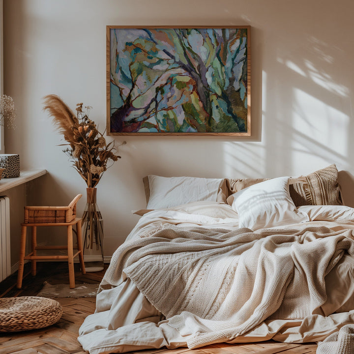 A framed original abstract Australian bush painting with swirling green blue and purple branches on stretched canvas