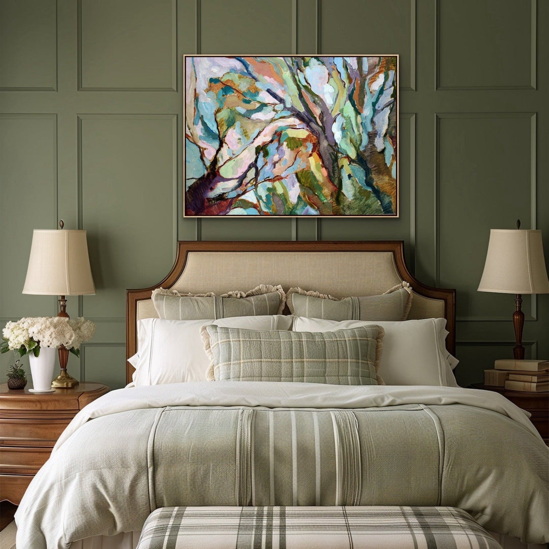 Bedroom with green walls, a bed with striped bedding, and abstract art above the bed.