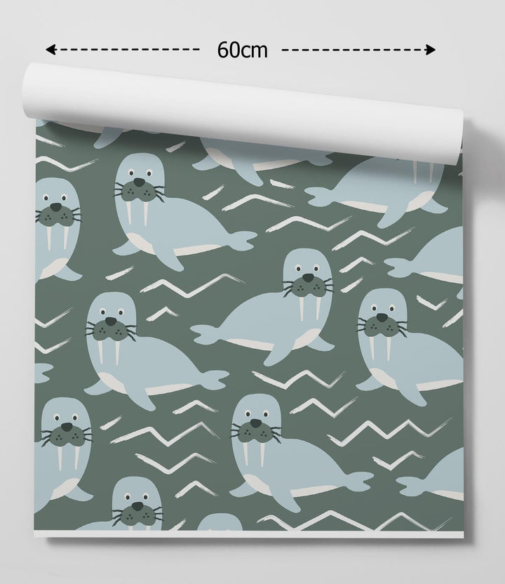 A roll of fun walrus peel and stick removable wallpaper with light blue cartoon walruses on dark green background