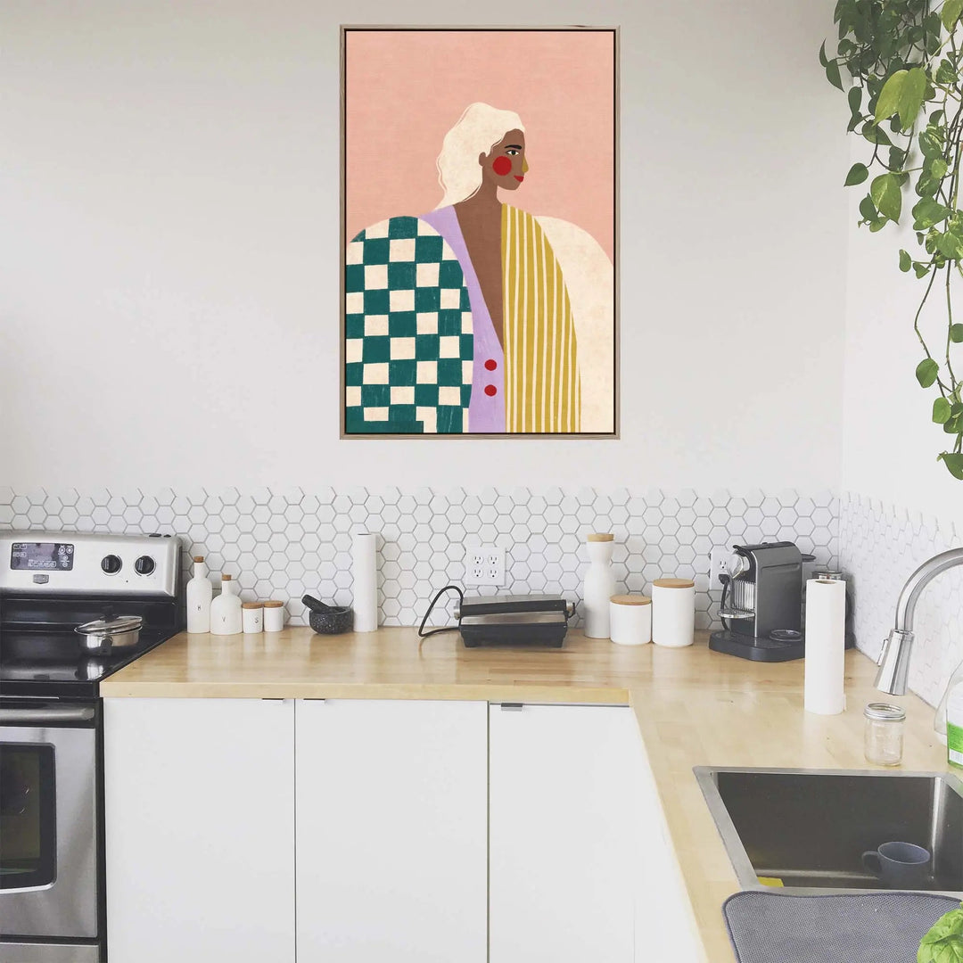 A framed colourful contemporary stretched canvas print of an abstract portrait of a woman by Bea Muller