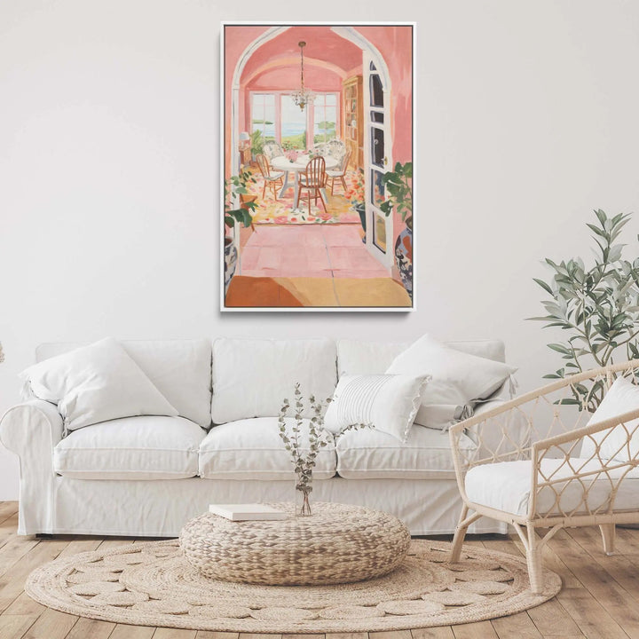 Hazy memories framed fine art print featuring a pink arched doorway to a sunlit dining area with white furniture