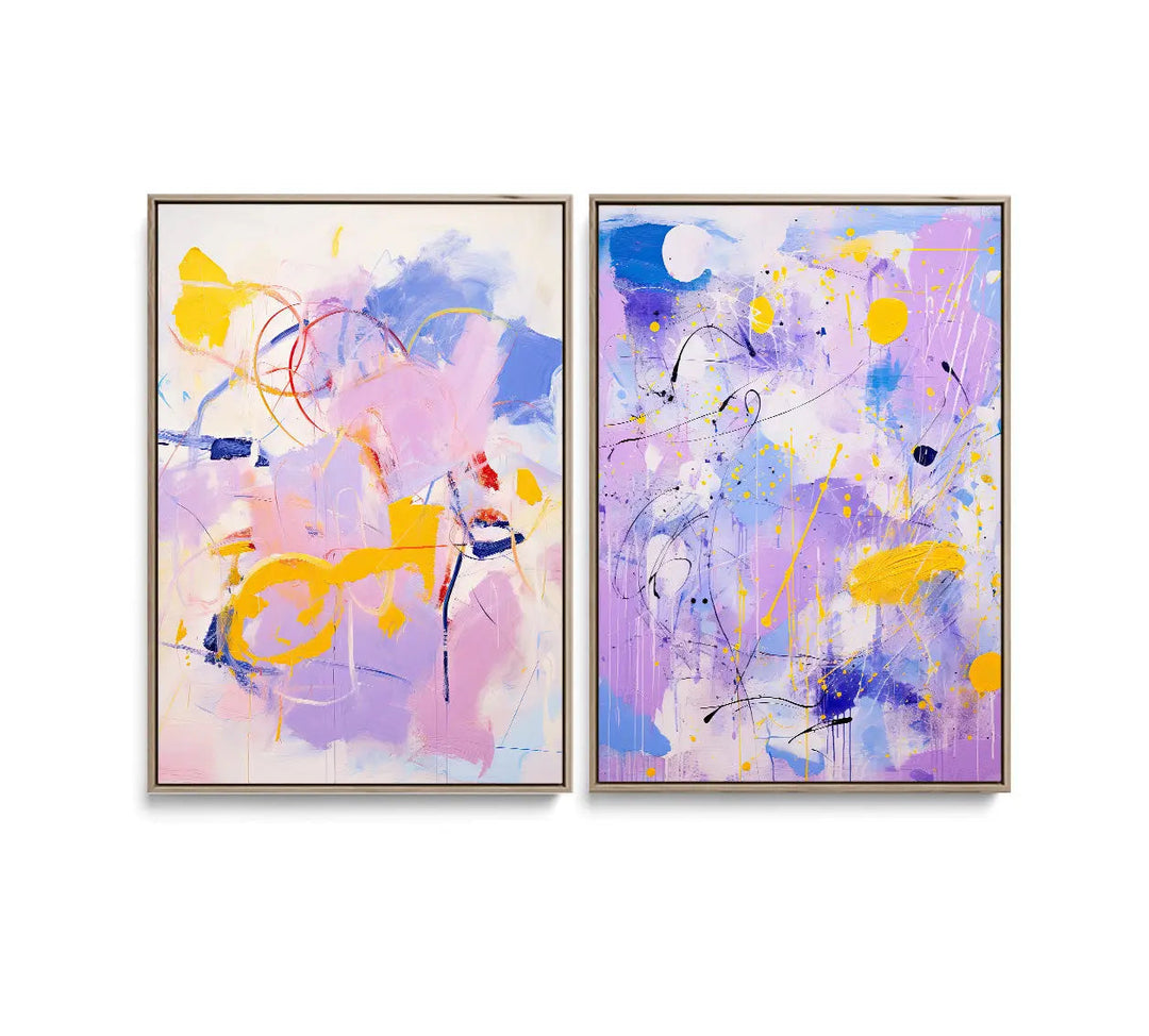 A pair of abstract paintings with vibrant purple pink blue yellow and white splashes in lilac dreams print set