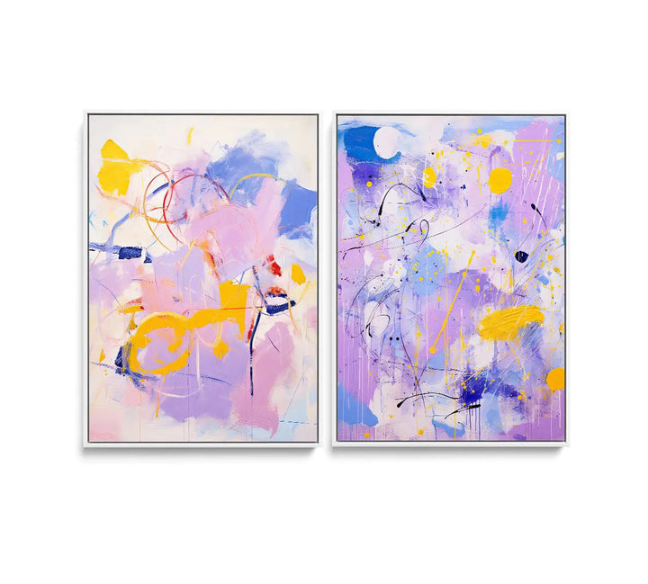 Two abstract paintings with vibrant purple yellow blue and pink splashes on canvas in white frames lilac dreams set