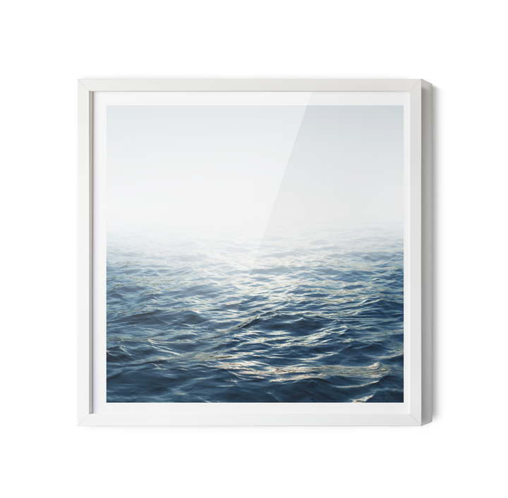 Moonlit ocean hamptons water coastal print on canvas featuring deep blue waves and white mist in a white frame