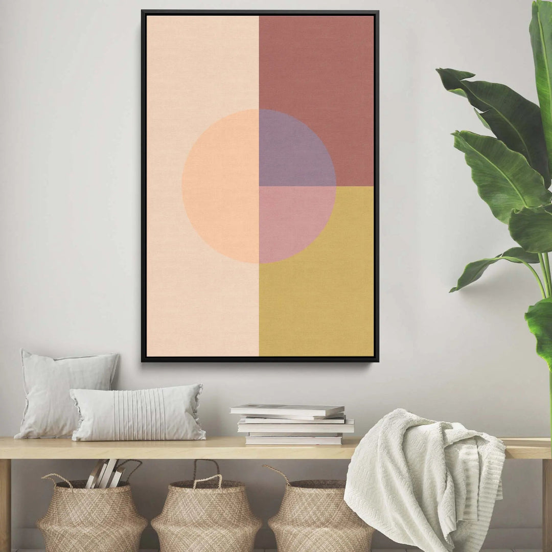 A modern abstract pastel geometric stretched canvas print with peach mauve and mustard yellow in a black frame