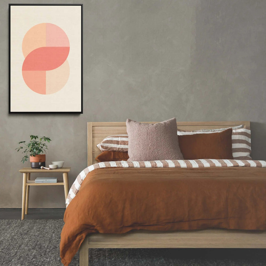 Minimalist abstract peach 42 pastel geometric stretched canvas print with overlapping circles on cream background framed in black
