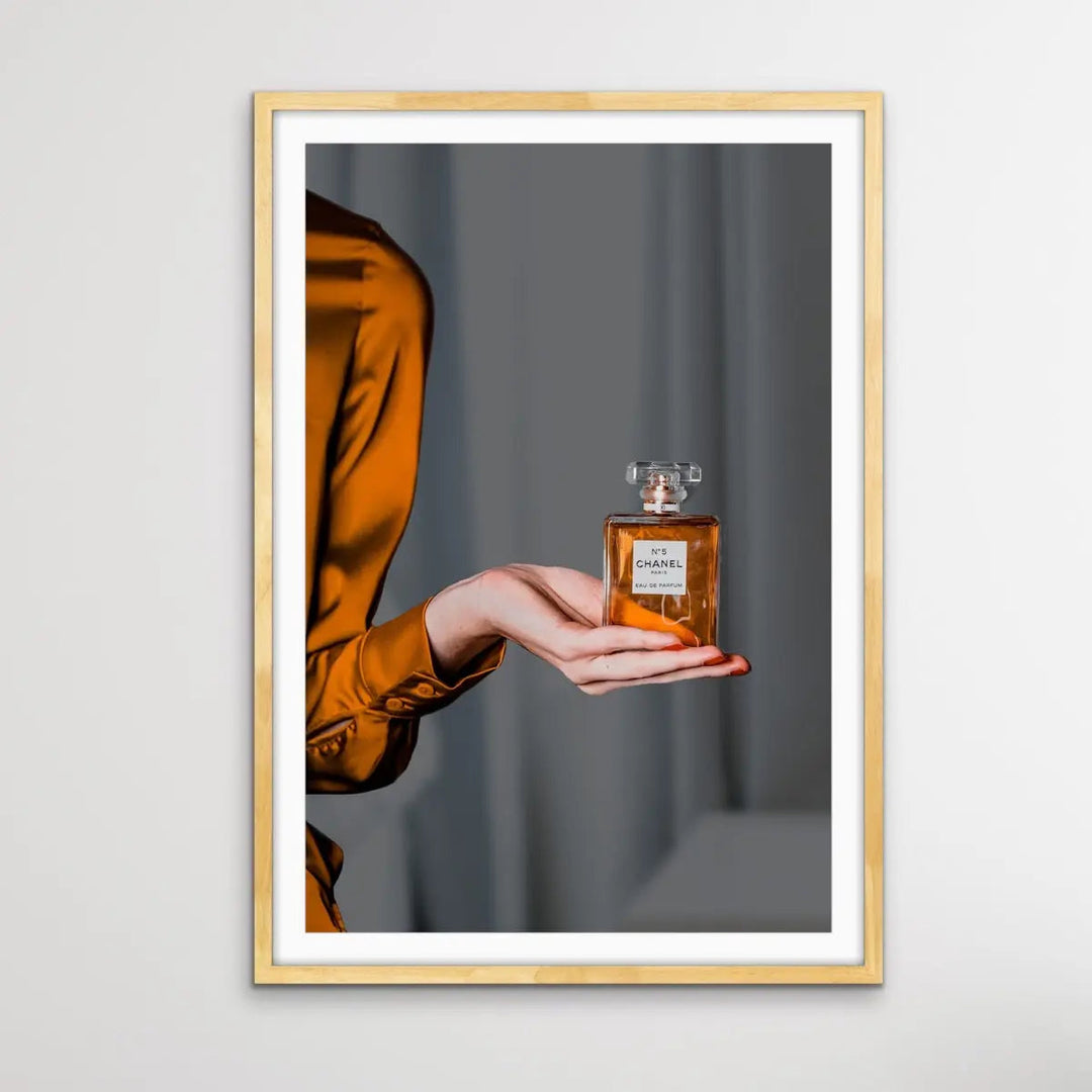 Perfume In Shades of Gold - Gold/Bronze Photographic Print of Woman Holding Bottle of Chanel Perfume I Heart Wall Art Australia 
