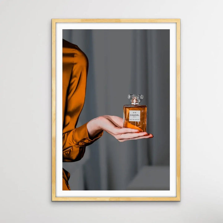 Perfume In Shades of Gold - Gold/Bronze Photographic Print of Woman Holding Bottle of Chanel Perfume I Heart Wall Art Australia 