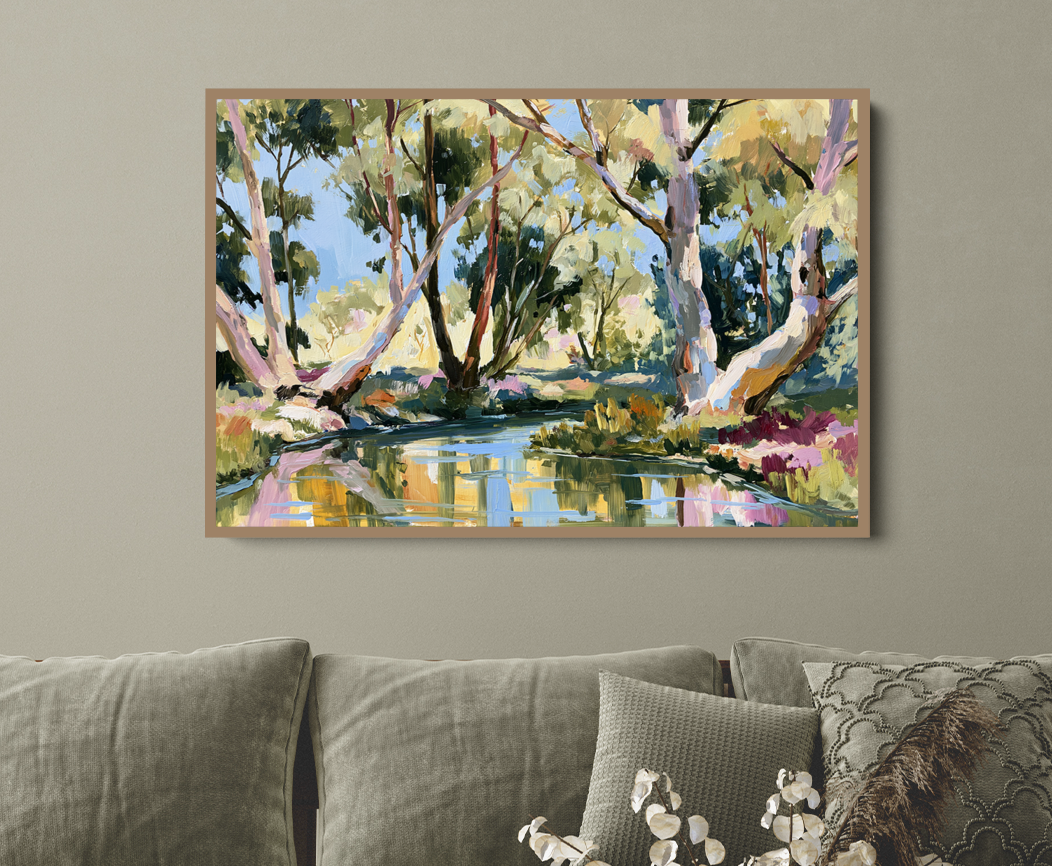 Living room with a gray sofa, wooden coffee table, and a large landscape painting on the wall.