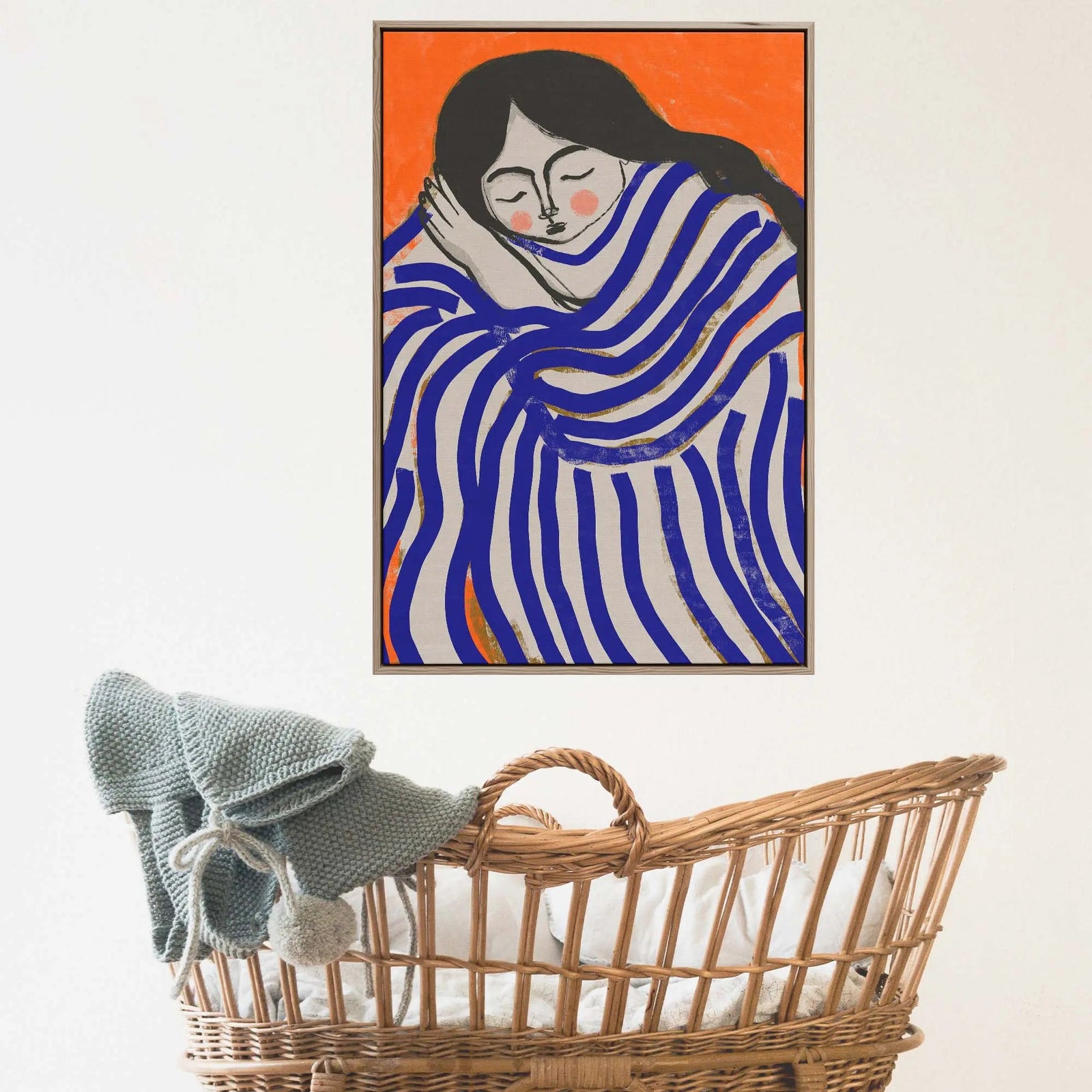 A framed print titled resting beauty by Treechild featuring a woman in bold blue and white stripes on orange background