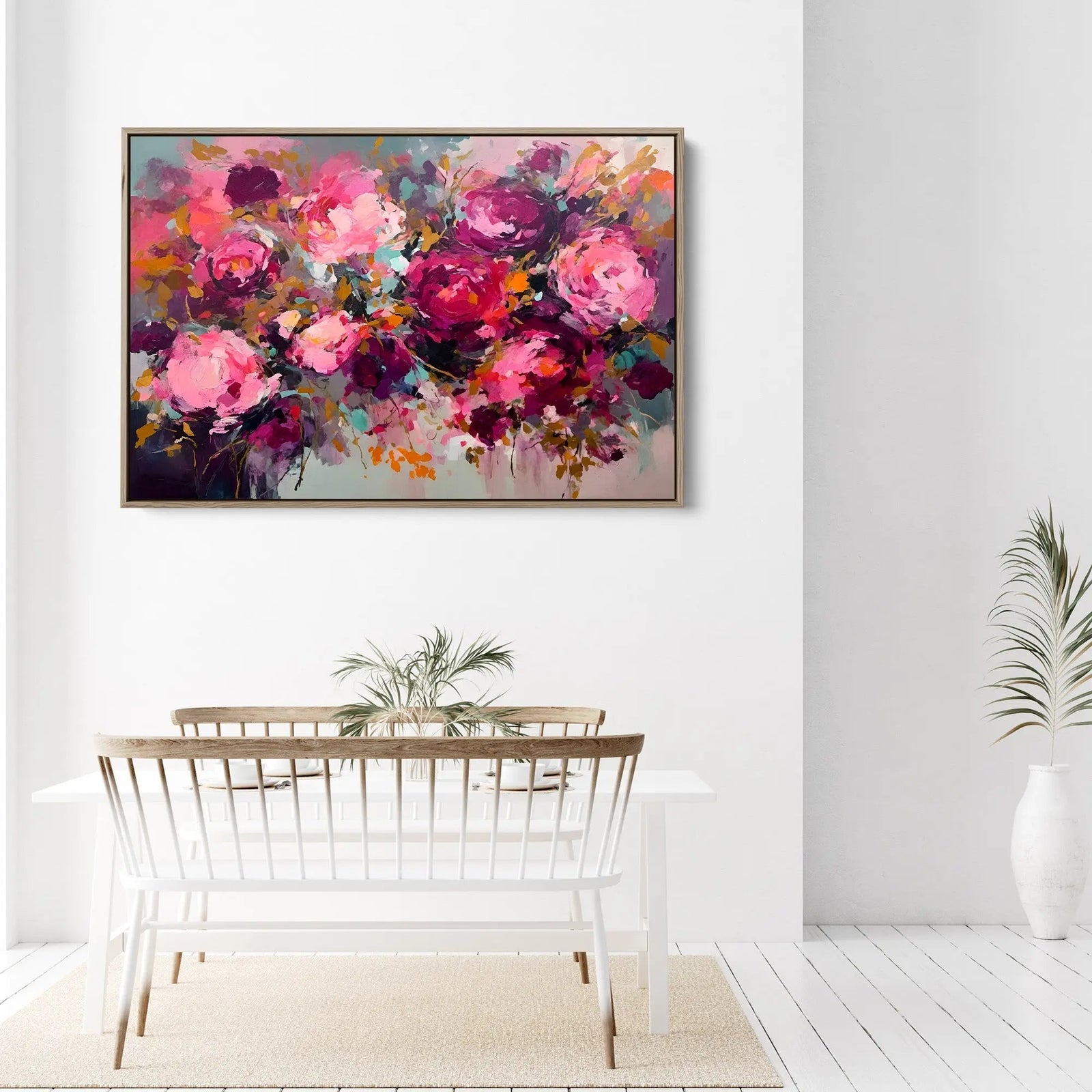 A vibrant abstract floral painting in a sleek light wood frame on a rosy one floral bouquet canvas print