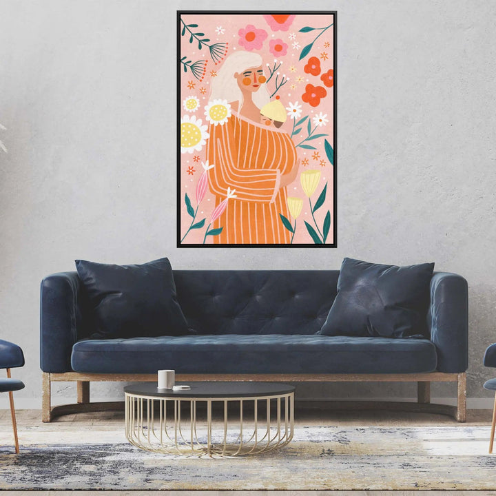 A framed fine art print of a woman in an orange striped dress with colorful flowers on a pink background by Be Muller