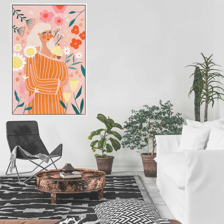 Spring mum by be muller peach-toned floral stretched canvas print featuring a woman in an orange striped dress with blossoms