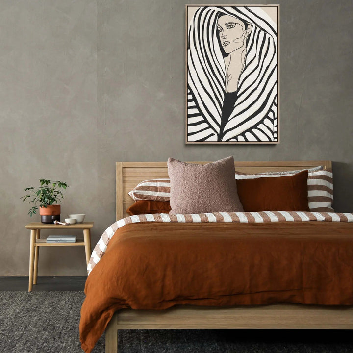 Black and white zebra-striped framed artwork of a womans face on stretched canvas print by Treechild