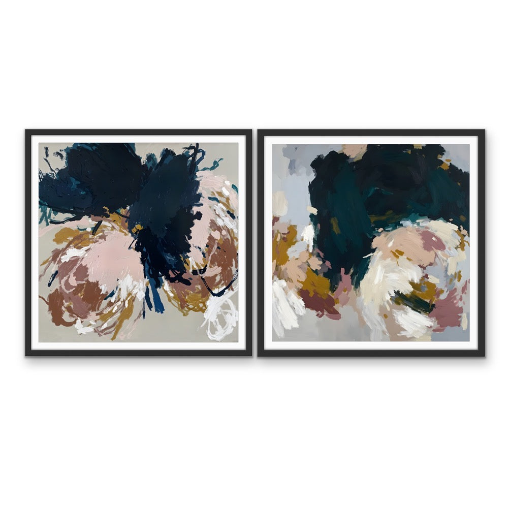 Two framed abstract floral prints with bold brushstrokes in navy blush pink gold and gray titled the unravelling