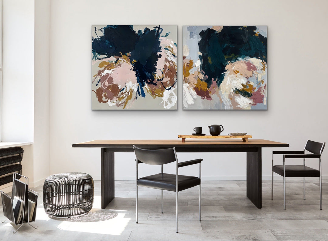 Two piece square abstract floral prints featuring bold navy blush pink ochre and gray brushstrokes on canvas