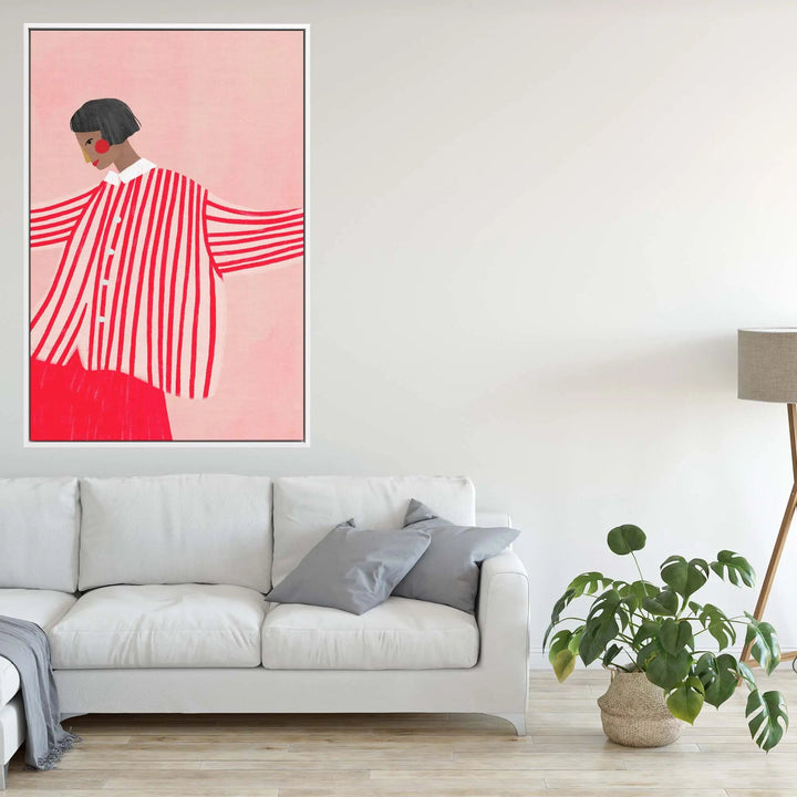 A framed contemporary art print titled the woman with the red stripes by bea muller featuring a stylized figure in red and white stripes on a pink background