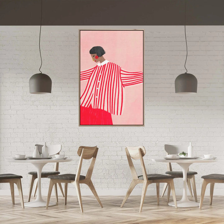 A framed contemporary art print titled the woman with the red stripes featuring red and white stripes on pink