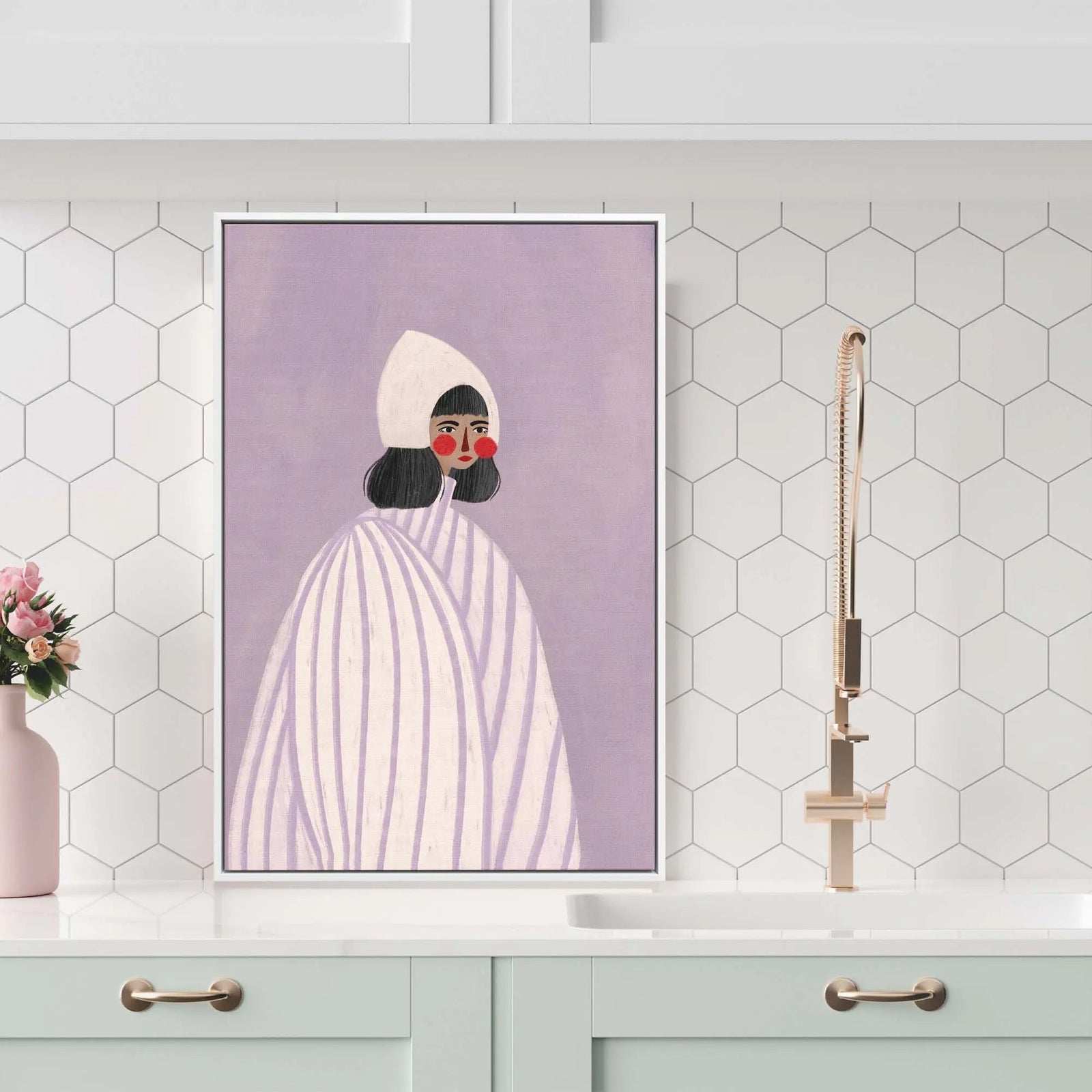 A framed fine art print of the woman with the white hat by Bea Muller featuring a stylized woman in a white hooded robe on lavender background