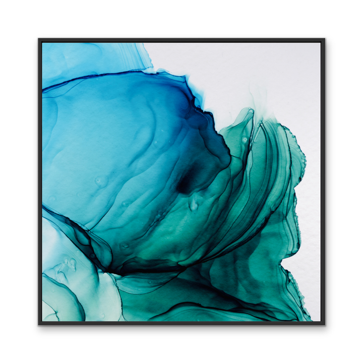 A framed abstract alcohol ink wall art print featuring swirling blue and teal gradients on a white background