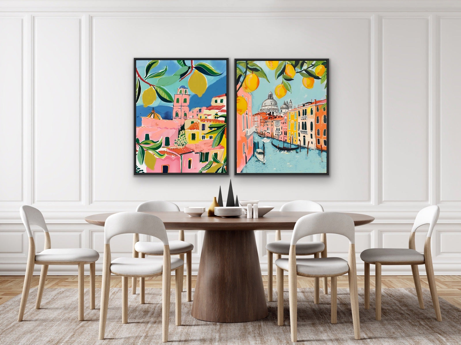 Two vibrant mediterranean lemon tree paintings in pink blue and orange set on stretched canvas above wooden table