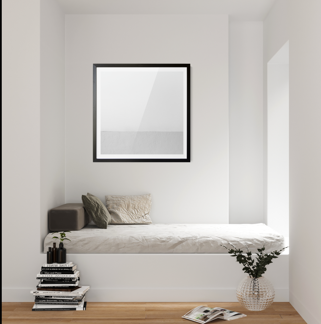 White whispers square abstract white grey geometric wall art canvas print with black frame hanging on white wall