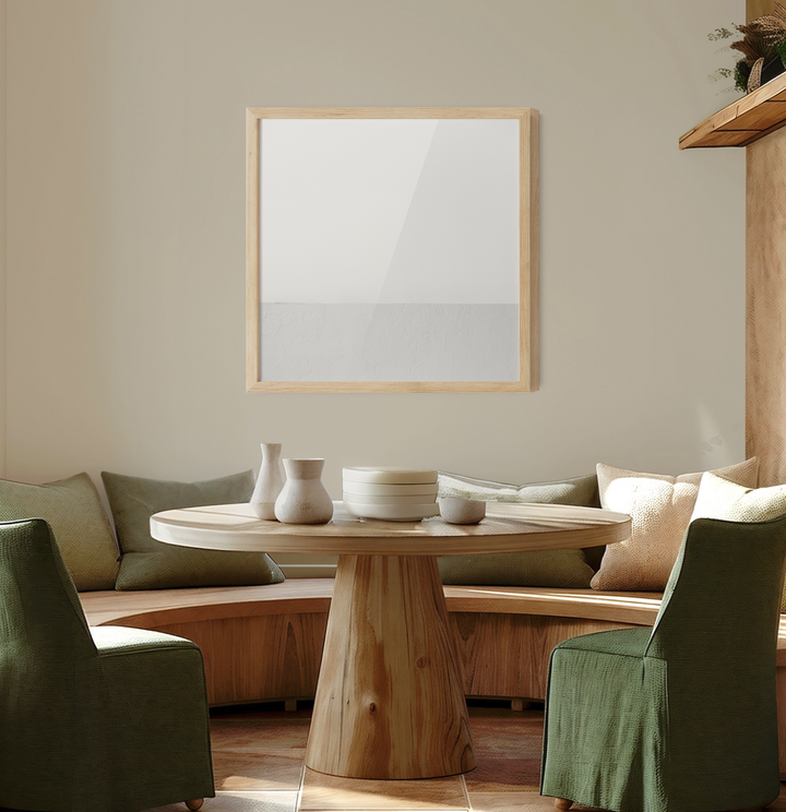 A minimalist square-framed mirror with light wood frame and two-tone reflective surface in white whispers wall art style