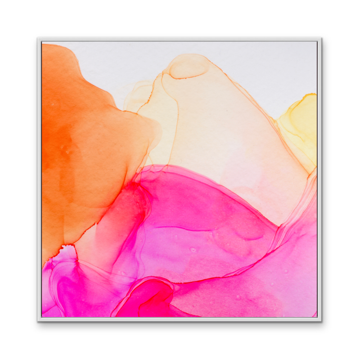A vibrant abstract alcohol ink painting in pink orange with flowing gradients in a sleek silver frame wall art print