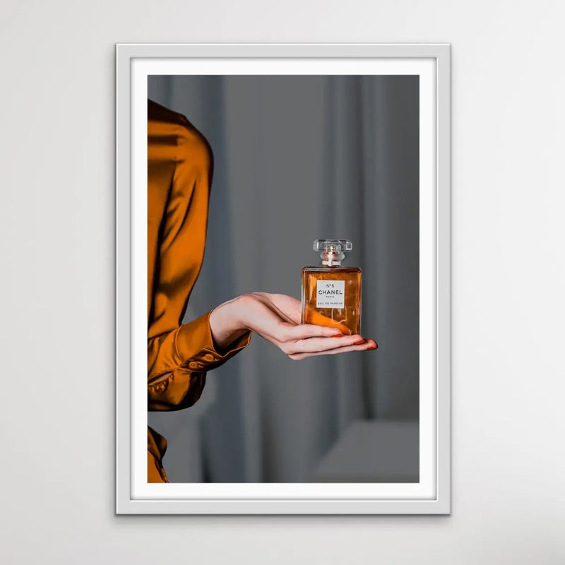 Perfume In Shades of Gold - Gold/Bronze Photographic Print of Woman Holding Bottle of Chanel Perfume I Heart Wall Art Australia 